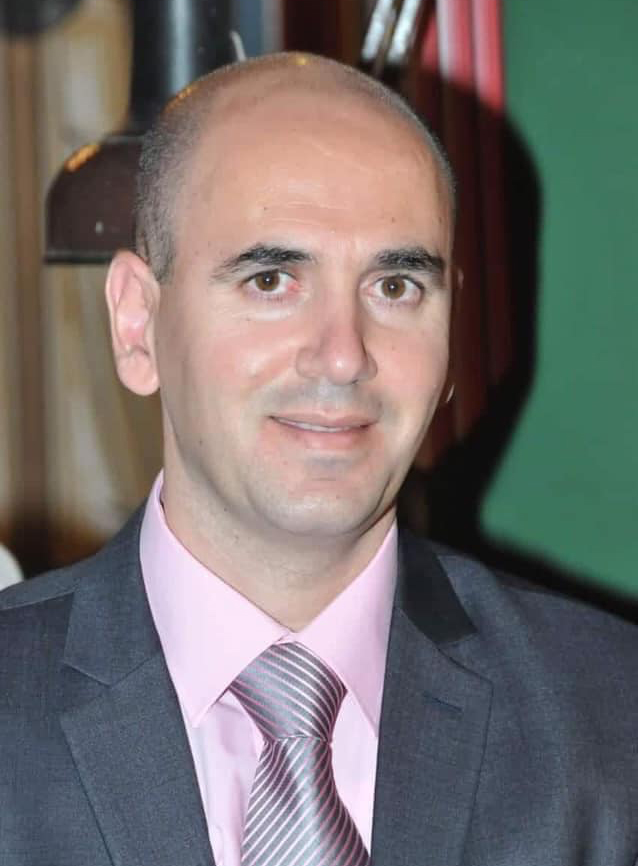 Dr. Raja'i Qumsieh